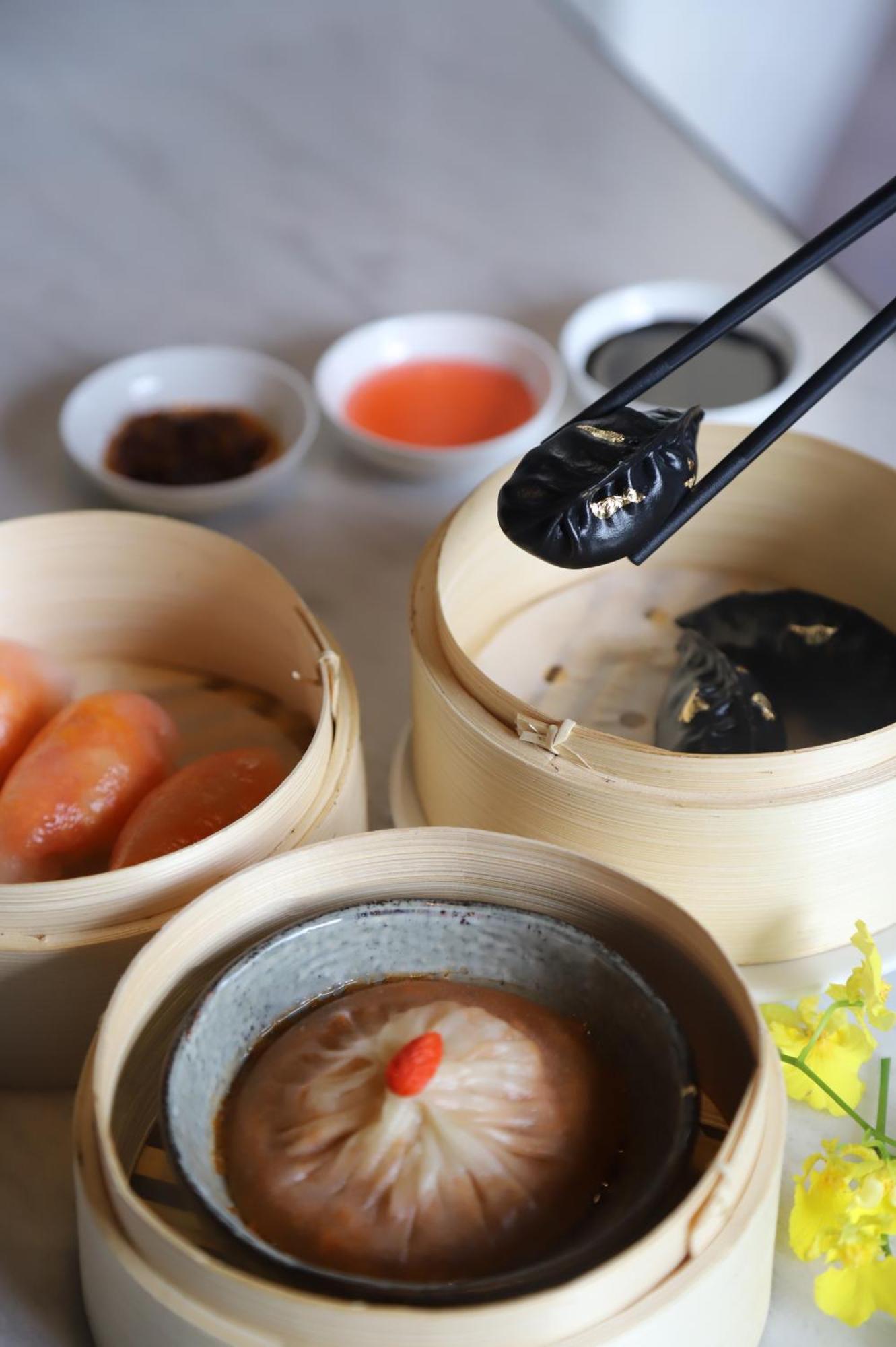 Melia Hanoi Dış mekan fotoğraf Soy sauce being used with dim sum
